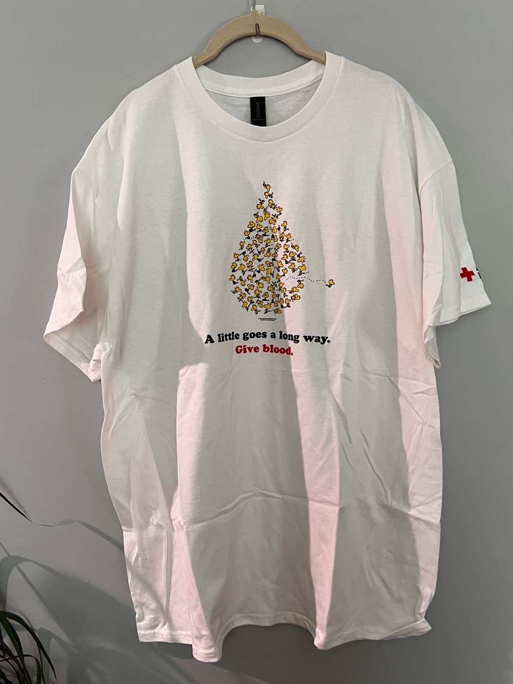red cross x snoopy tee